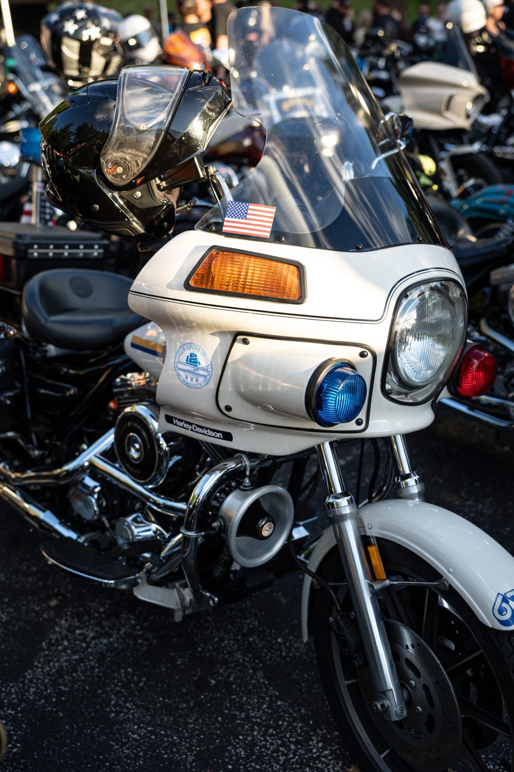 White club style bagger with blue dash light at Laconia Harley-Davidson