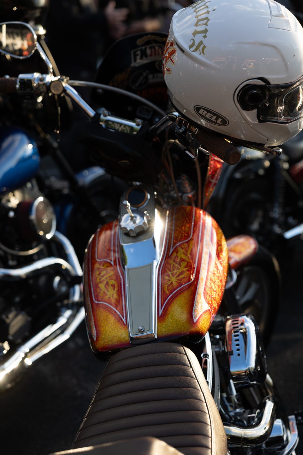 Custom airbrushed tank and helmet detail at the Proper Baggers show